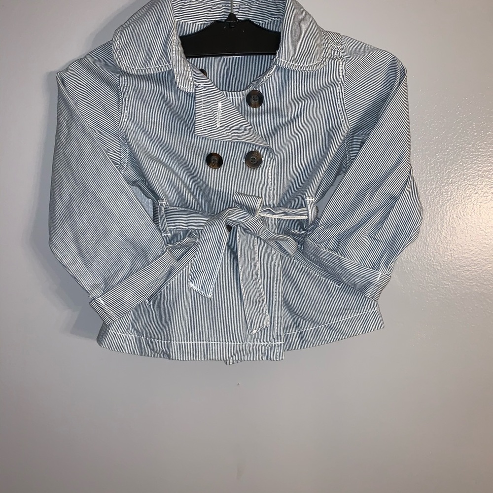 Navy blue trench style Jean jacket.